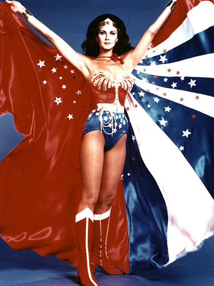 This is the poster I had hanging on my wall for years of Lynda Carter as Wonder Woman. Photo Credit: Everett Collection on People.com