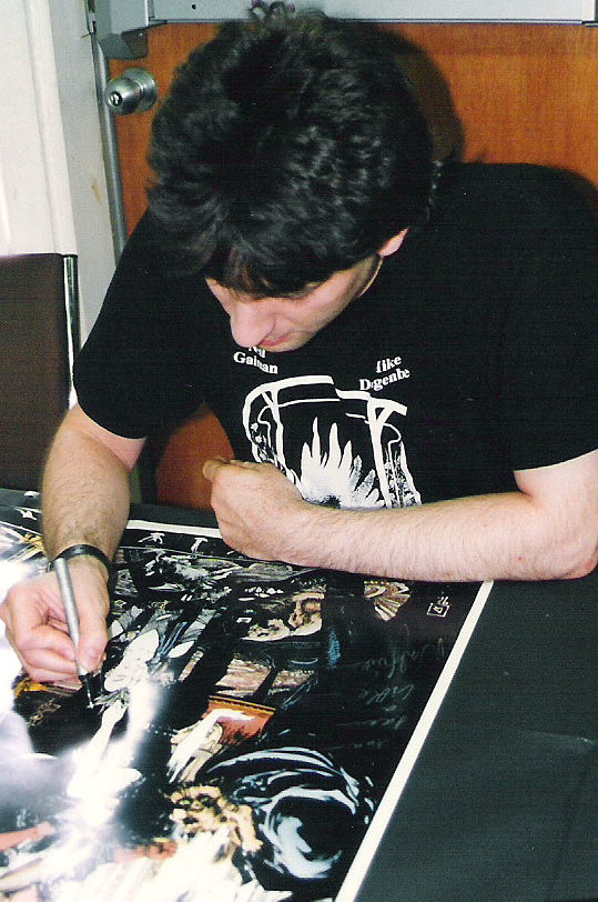 Neil Gaiman signing my poster